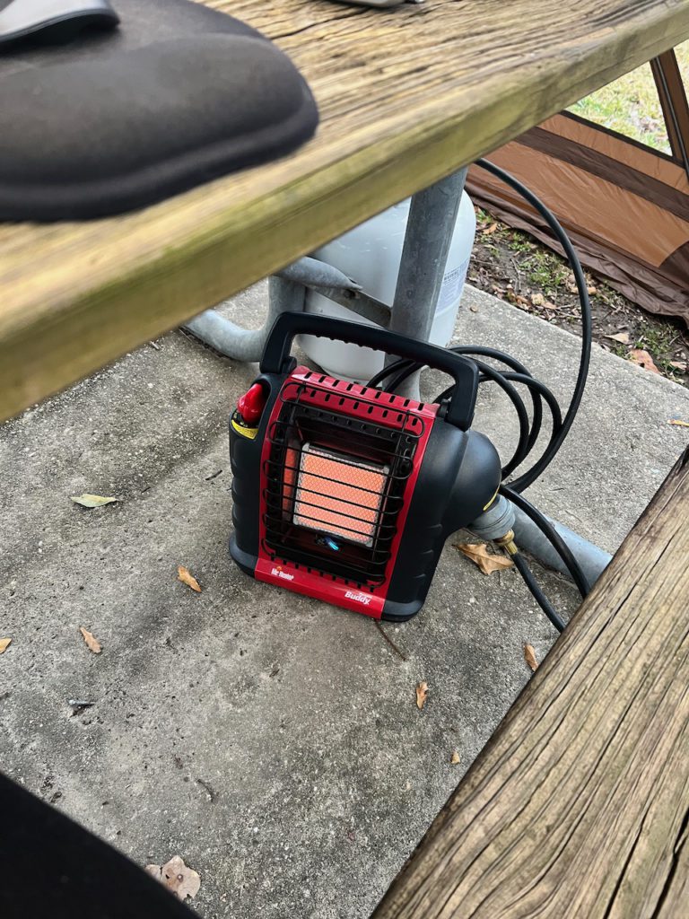 Mr. Buddy heater under the picnic table